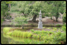 Steinpagode auf einer Insel im Anmintaku Teich